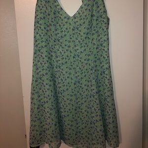 Light, floral dress with mini opened back